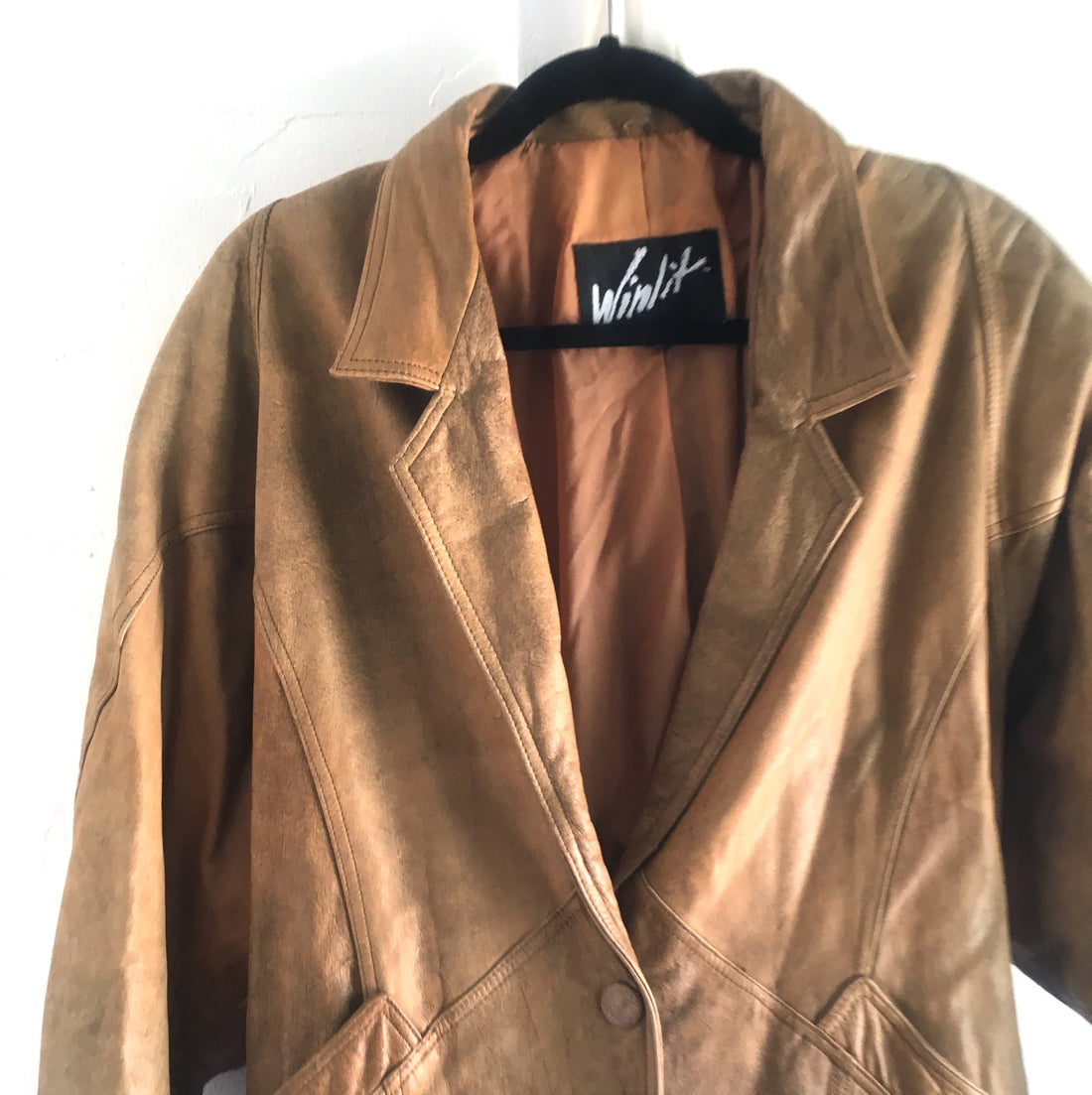 coat used for distressed tan hobo bag