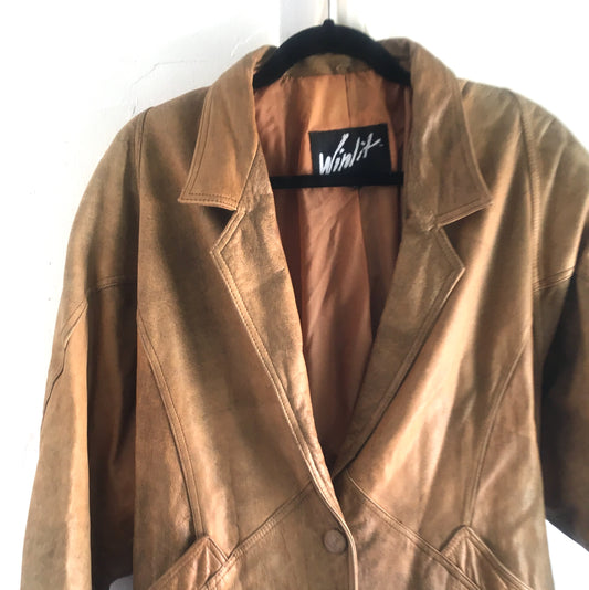 coat used for distressed tan hobo bag