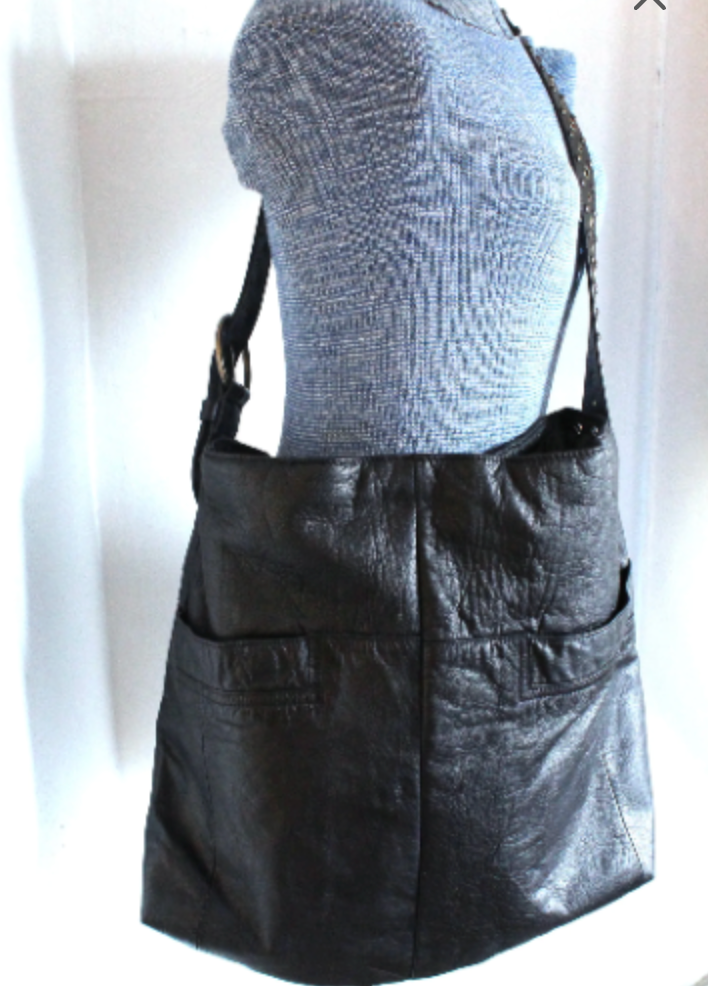 Black leather hobo on manequin
