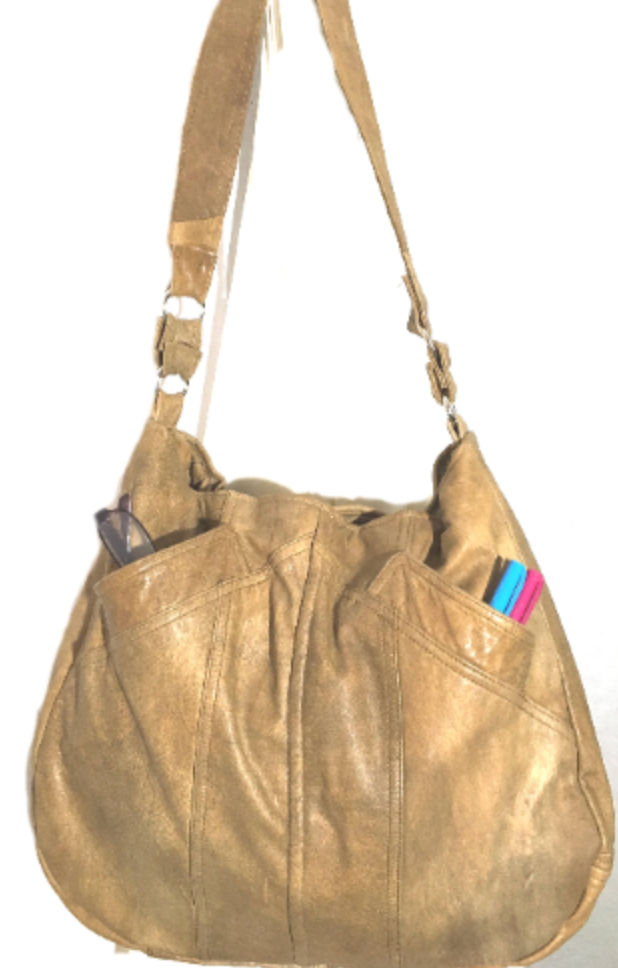 Tan Distressed Leather Hobo Bag with pens