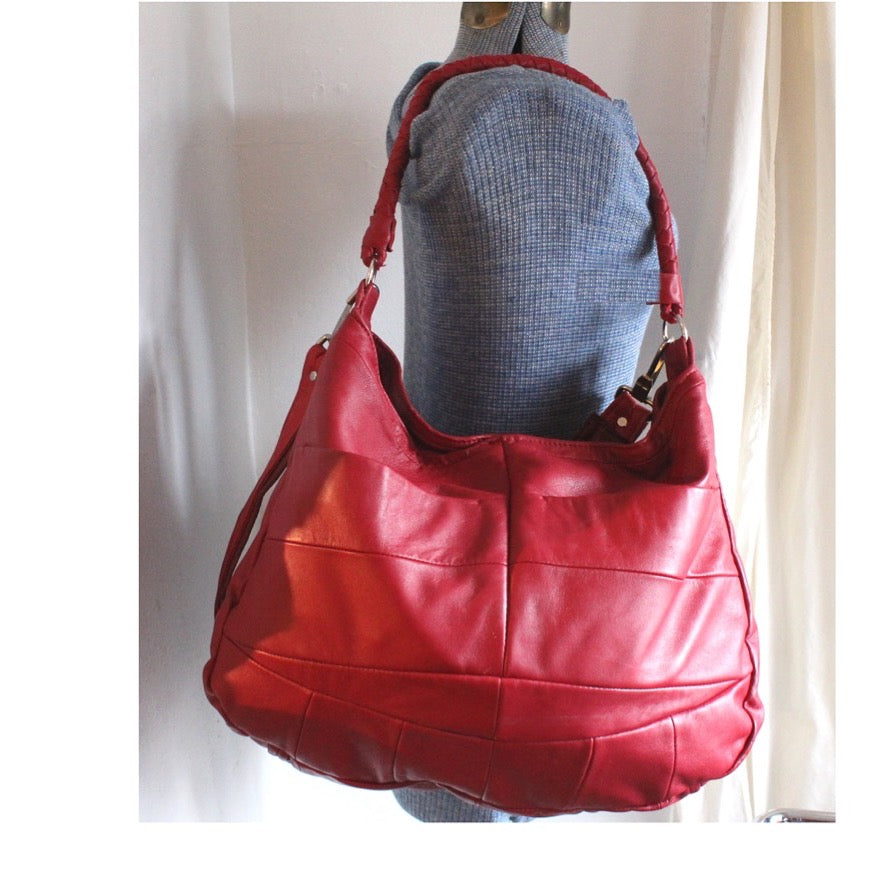 Red hobo bag on manequin